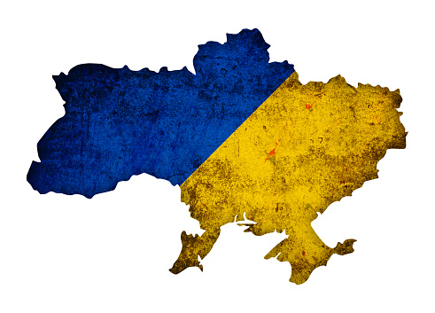 (Clipping path) Grunge flag of Ukraine on the map isolated on white background
