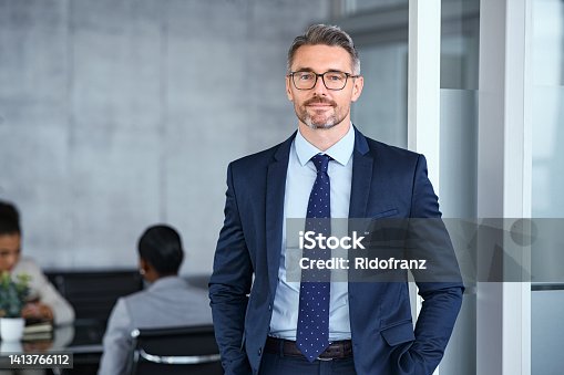 istock Successful mature businessman looking at camera with confidence 1413766112