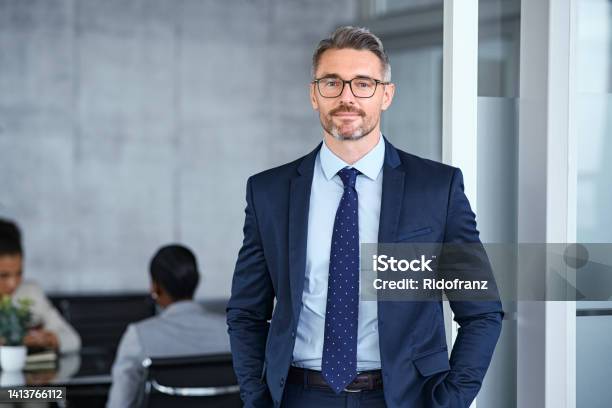 Successful Mature Businessman Looking At Camera With Confidence Stock Photo - Download Image Now