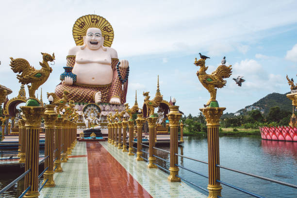 istock Statue Against Temple And Building Against Sky 1413766556