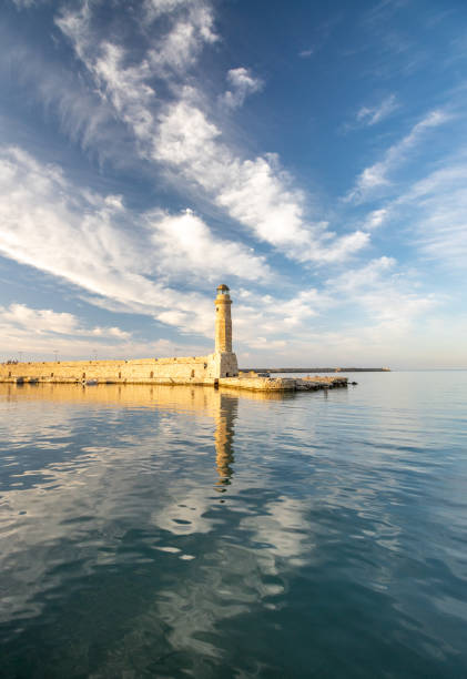 istock Dramatic Sky over Rethymnon Lighthouse at Rethymno Town in Crete, Greece 1413767106