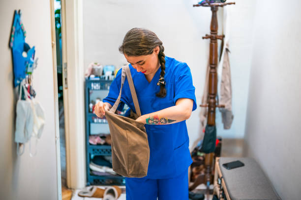 istock Woman with Scrubs getting ready to leave for work 1413768239