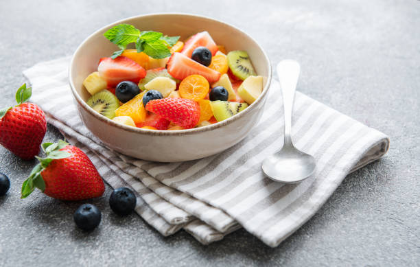 istock Healthy fresh fruit salad in a bowl 1413769083