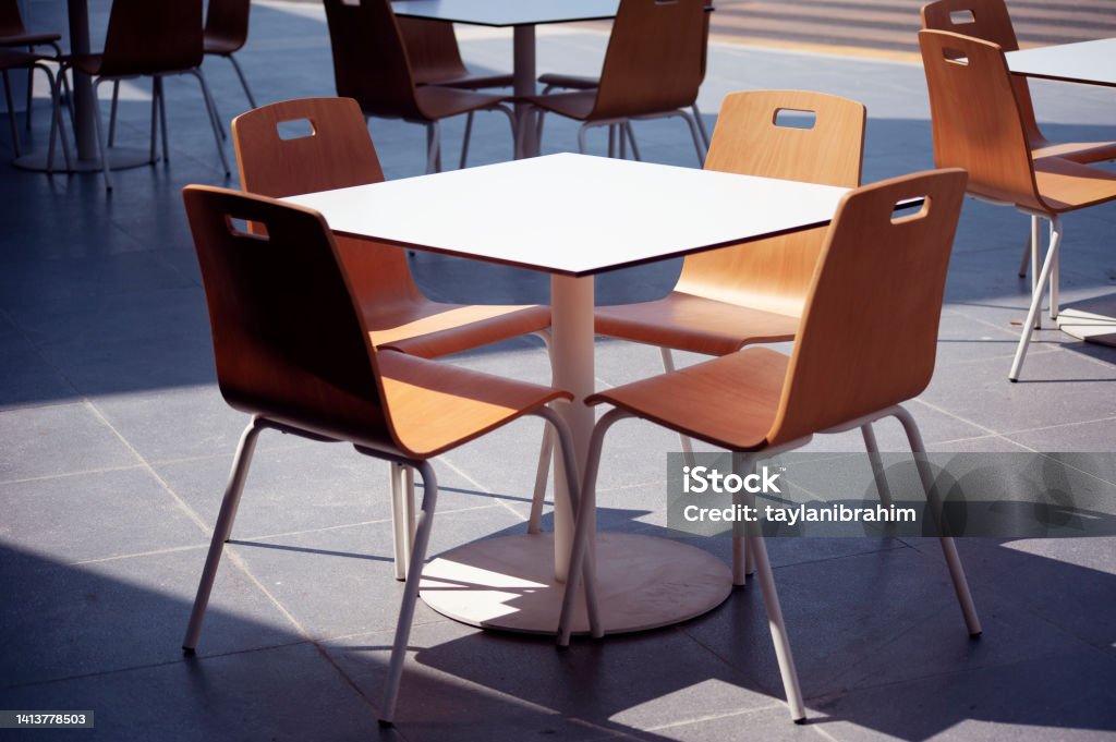 Empty Rauntant Table Inside Empty Table At A Restaurant Stock Photo - Download Image Now ...