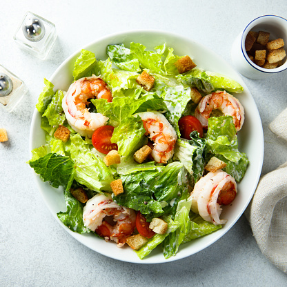 Traditional Caesar salad with shrimps