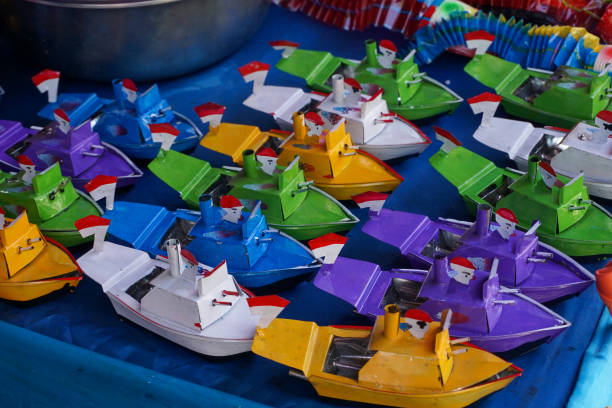 https://media.istockphoto.com/id/1413785322/photo/a-collection-of-traditional-boat-toys-in-a-toy-merchant-at-pkb-bali.jpg?b=1&s=612x612&w=0&k=20&c=SP9pxisYT0jhX1NBj6MYLk28hIA5rDiV5SIYSfOAeeo=
