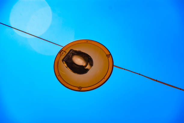 Old street Lamp against blue sky