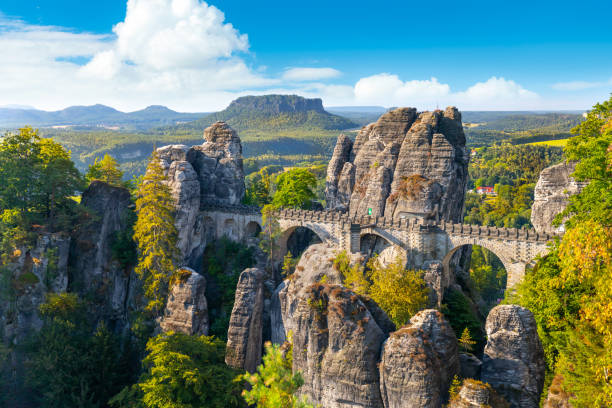 Panorama view of the Bastei. The Bastei is a famous rock formation in Saxon Switzerland National Park, near Dresden, Germany stock photo