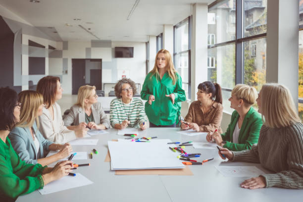 istock Mature business professionals attending meeting 1413792766