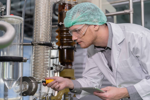 istock cannabis plantation plant engineer routine check the distillation glass 1413794309