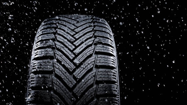 istock Water splashing on tyre 1413795212