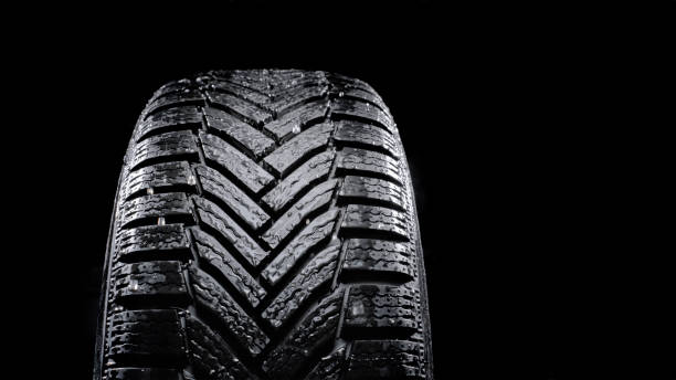 Wet vehicle tyre stock photo