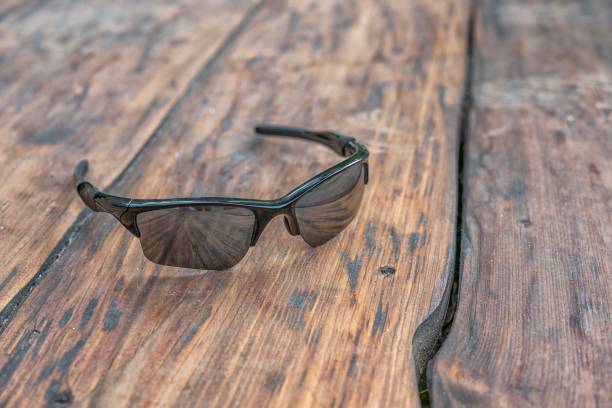 istock Sunglasses on wooden background 1413796128