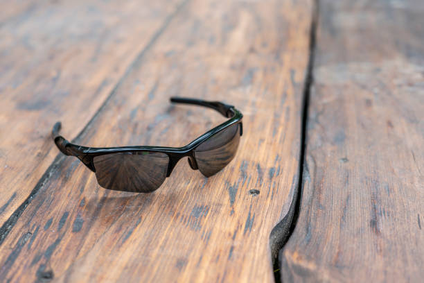 istock Sunglasses on wooden background 1413796640