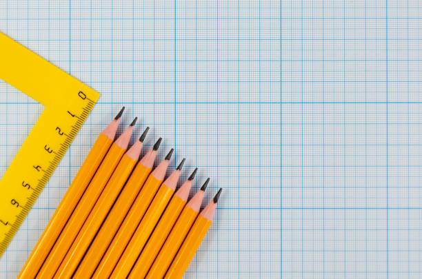istock Pencils, ruler on blue background graph paper. text space. Back to School. office supplies. 1413796810