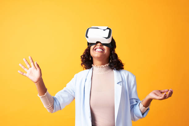 Ai metaverse gamer plays with virtual reality technology, wearing a vr headset. User experiences new futuristic gaming device in interactive environment. Visual simulation goggles for entertainment