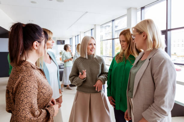 istock Colleagues looking at manager during meeting 1413800179