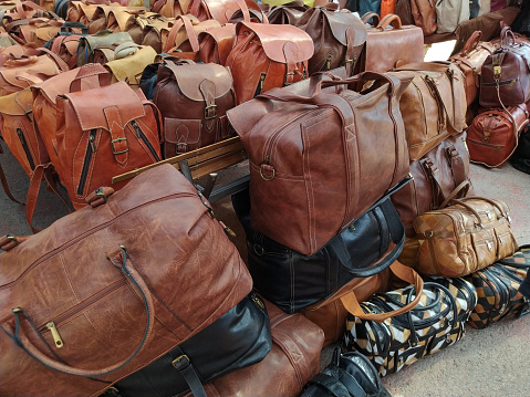 Close up of different leather bags on spanish marketplace