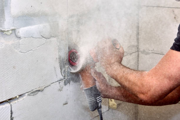 istock Angle grinder power tool for cut concrete with silicon carbide wheels is cutting masonry. 1413800956