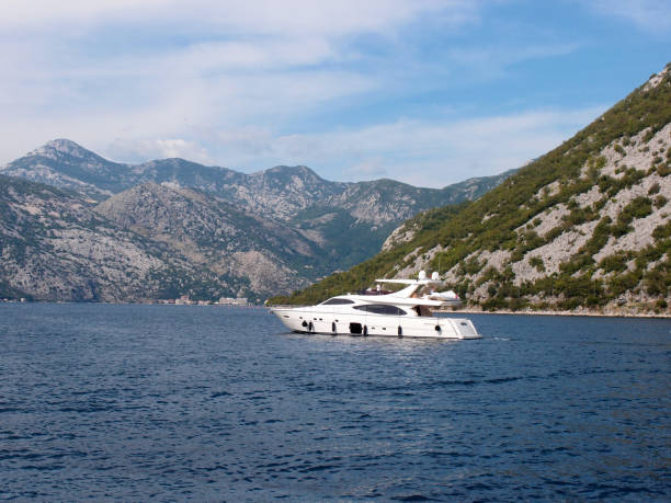 istock Pleasure yacht in the bay 1413802048