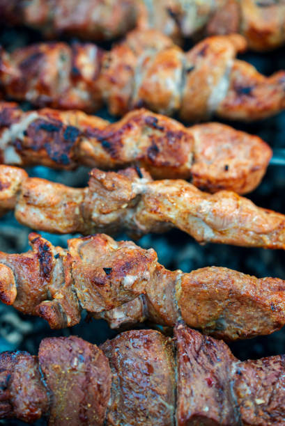 istock Tasty pork shashlik on the grill. 1413802052