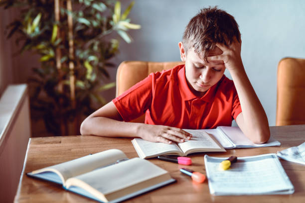 istock Homework Getting Hard To Write For Male Child With Myopia 1413802243