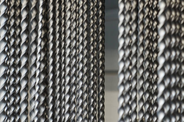 istock Bunch of hammer power drill bits in hardware store background, small depth of field 1413802409