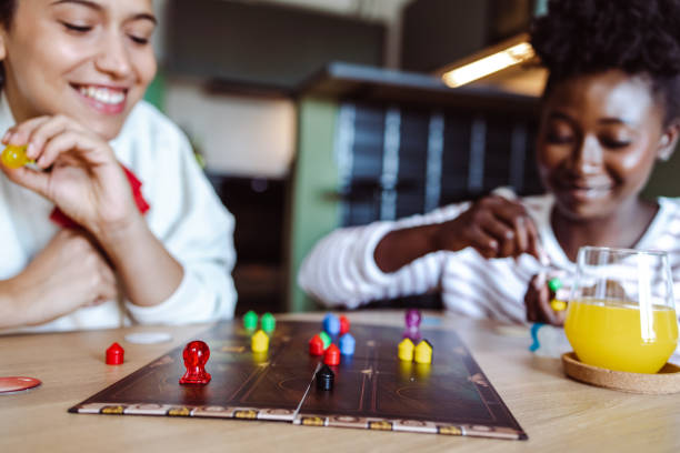 istock Girls playing board games 1413809298