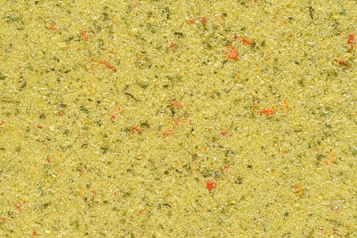 Yellow chicken stock powder condiment texture or background