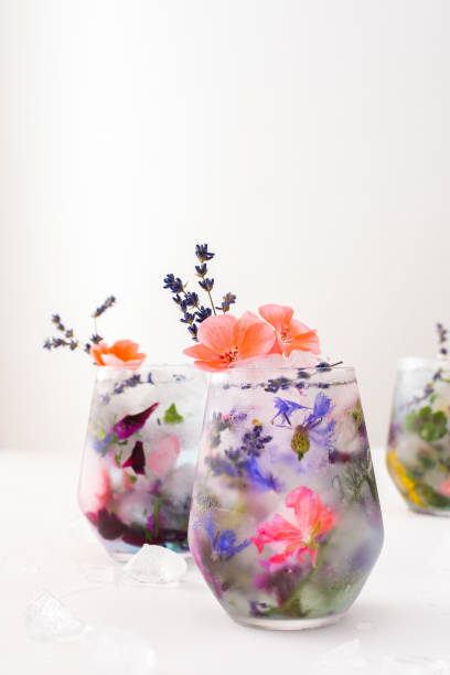 Cold drink with frozen flowers