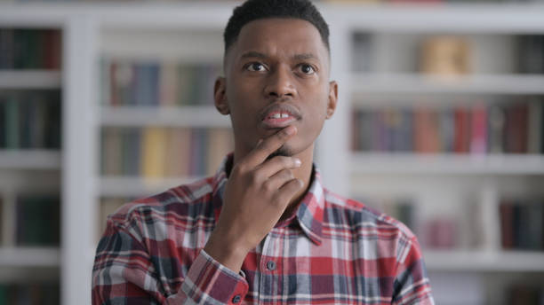 istock Portrait of Pensive African Man Thinking 1413813347