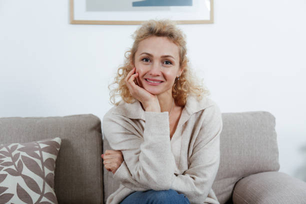 istock Blonde woman at home. 1413814572