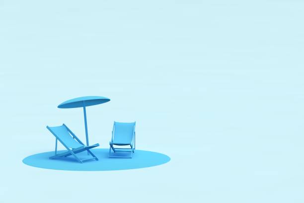 Summer concept with sunbeds and umbrellas