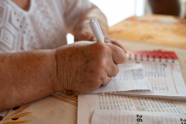 istock woman calculating expenses 1413818074