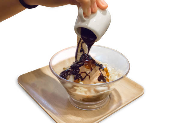 istock Top view of vanilla ice cream Topping with chocolate, focus selective 1413819635