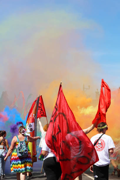 Brighton, England - August 6th 2022: Colourfully dressed participants at the Brighton & Hove Pride parade.One of the UK's most significant pride events is celebrating its 30th anniversary. Brighton & Hove Pride is intended to celebrate, and promote respect for, diversity and inclusion within the local community and support local charities and causes through fundraising.
