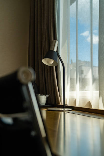 room with desk and table for working with mountain views