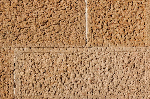 Close-up on a sandstone wall.