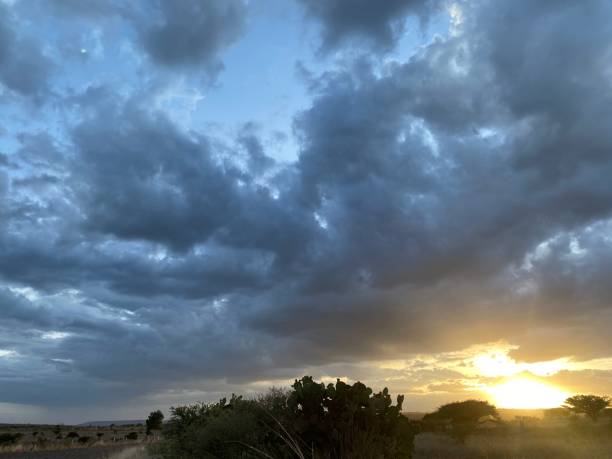 istock beautiful sunset in arid place with couds and blue sky in background 1413823034