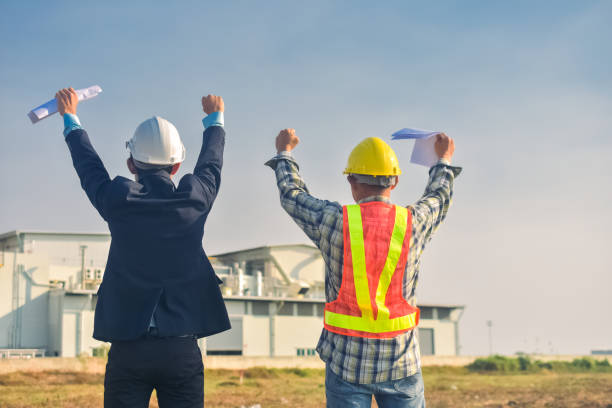 istock Asian engineer construction team checking work for control and management in the construction site or building site 1413826375