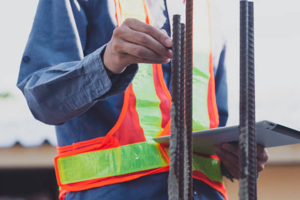 istock Asian Engineer construction are worker employee working by safety control helmet on site building 1413826380