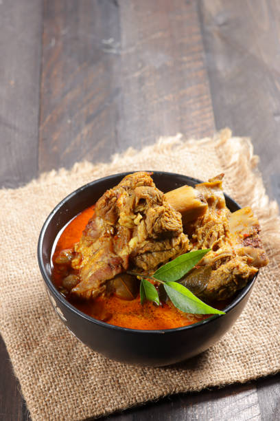 istock Kari iga sapi or Gulai iga sapi is Indonesian beef ribs curry. 1413827551