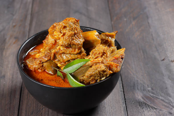 istock Kari iga sapi or Gulai iga sapi is Indonesian beef ribs curry. 1413827719