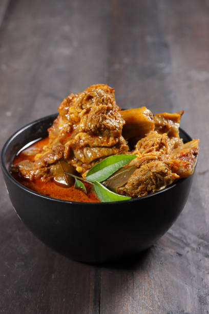istock Kari iga sapi or Gulai iga sapi is Indonesian beef ribs curry. 1413827729