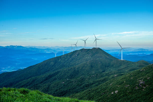istock Wind Turbine sin sunset, china. 1413827941