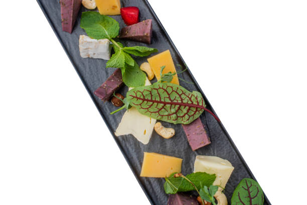 istock Fruit, meat and cheese assortment on the table. Exquisite food. Isolated 1413829600