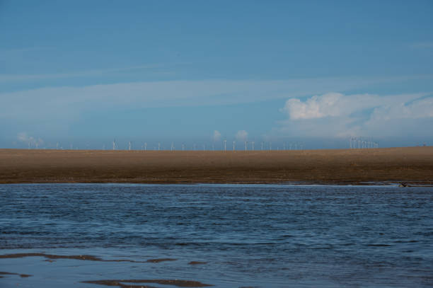 istock Sunny weather, offshore wind power station 1413830974