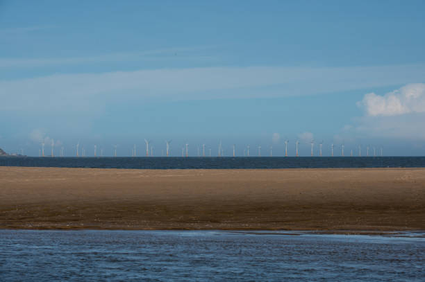 istock Sunny weather, offshore wind power station 1413831029