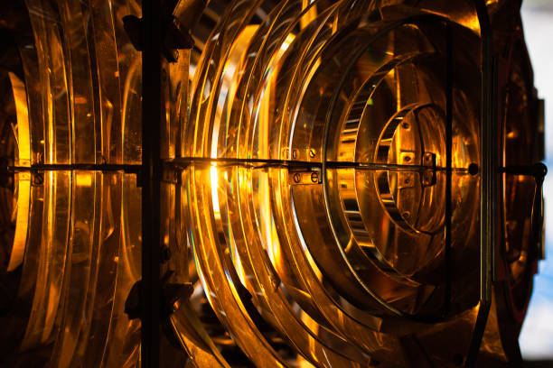 istock Rotating lighthouse lamp with a Fresnel lenses 1413833249