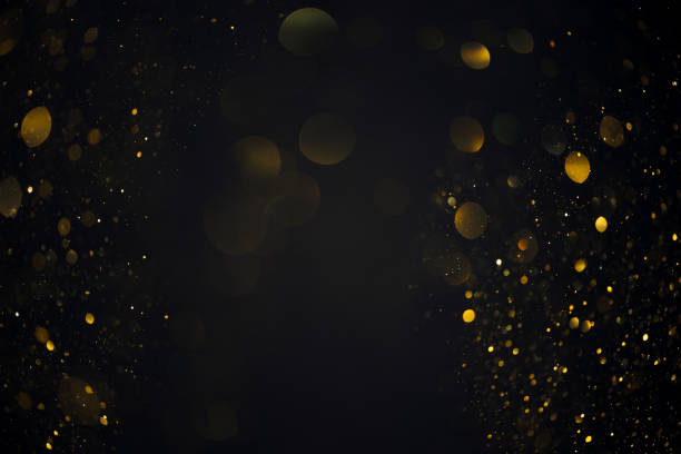 istock Dreamy golden swirly bokeh glitter lights overlay 1413836659